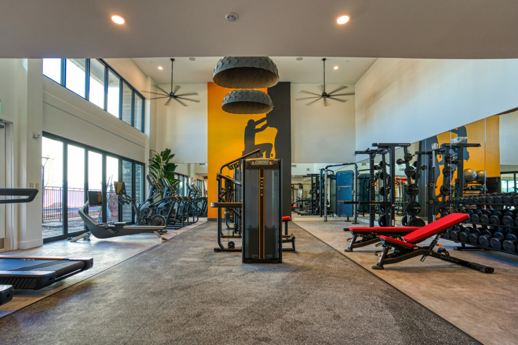 The Features to Elevate Your Lifestyle - fitness center with state-of-the-art gym equipment